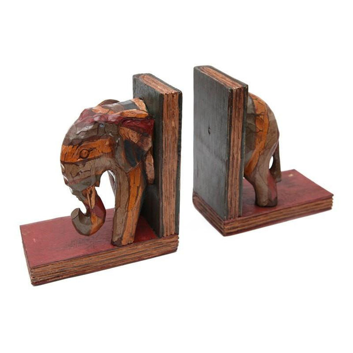 Carved wooden bookends in the shape of an elephant